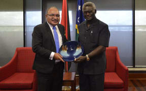 The MSG Chair and Prime Minister of Solomon Islands Manasseh Sogavare (L) and PNG Prime Minister Peter O'Neill (R)  at Sir Manasupe Haus.