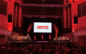 The red-lit Dunedin Town Hall, the venue for  this year's Labour party conference.