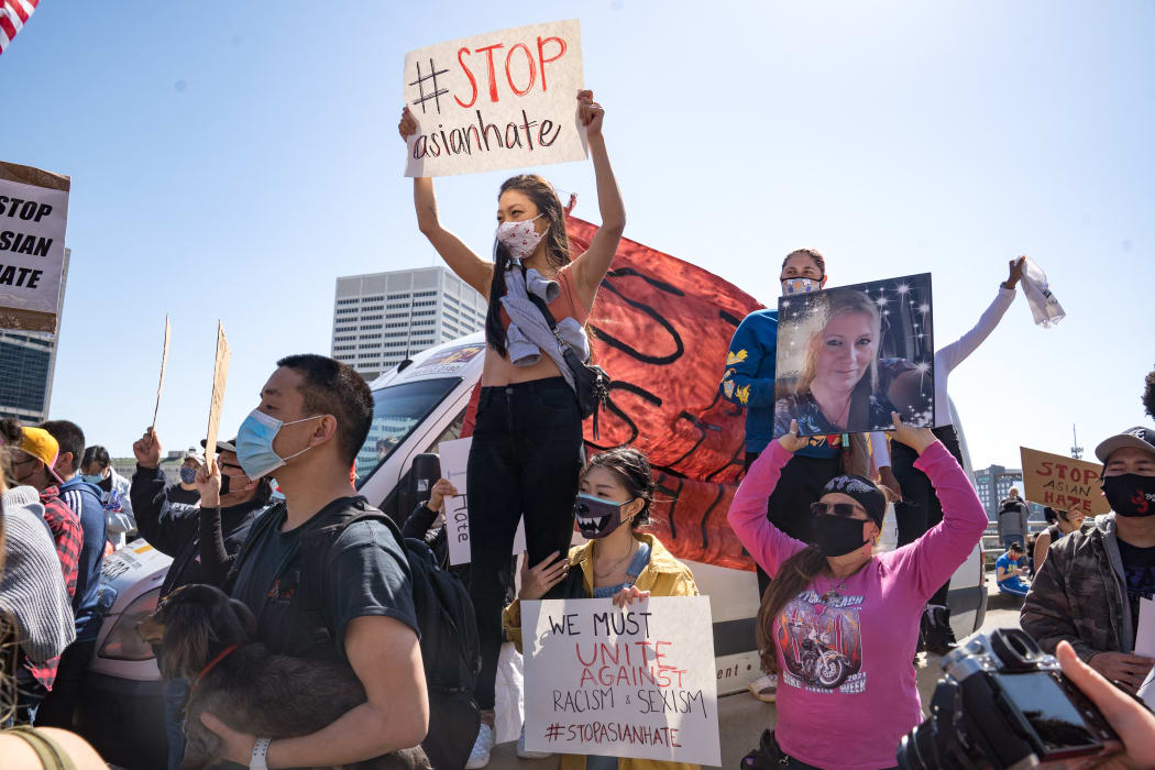Demonstrators take to the streets of Atlanta to show support for Asian and Pacific Islander communities on March 20, 2021 in Atlanta, Georgia, after a series of shootings at three spas.