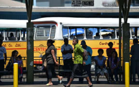 This photo taken on September 15, 2014 shows travellers at the central bus station as Fiji gets ready for the upcoming elections in Suva, the capital of Fiji.
