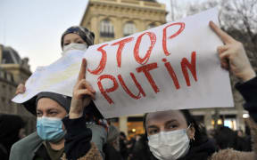 Ukrainians in Paris protest against Russia's invasion today.