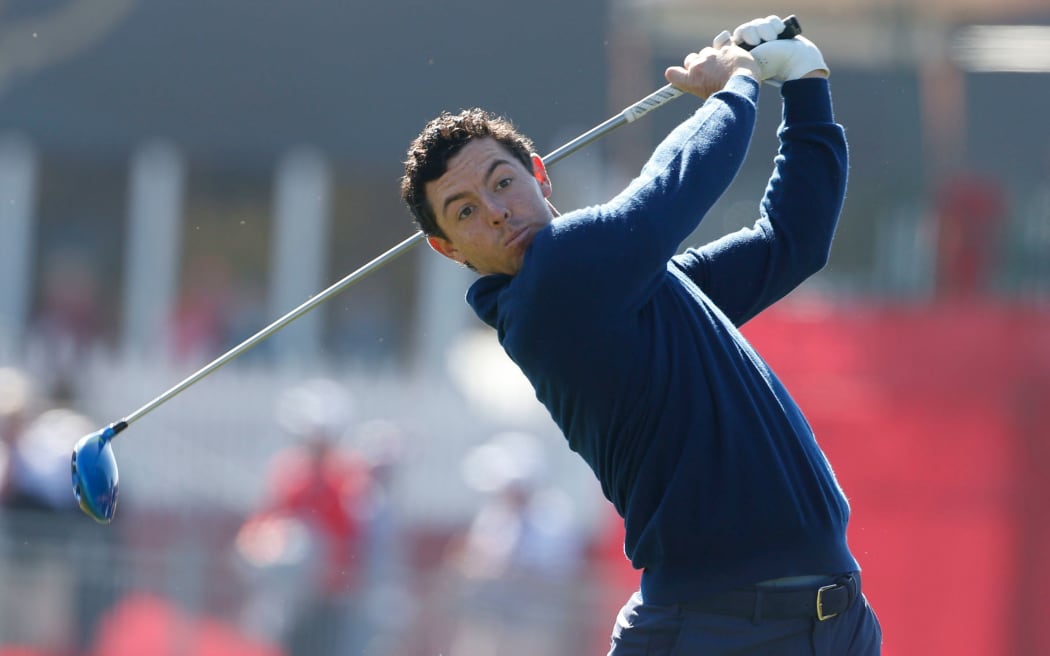 Rory McIlroy tees off on the 18th hole during the Day 1 morning matches for the 2016 Ryder Cup.