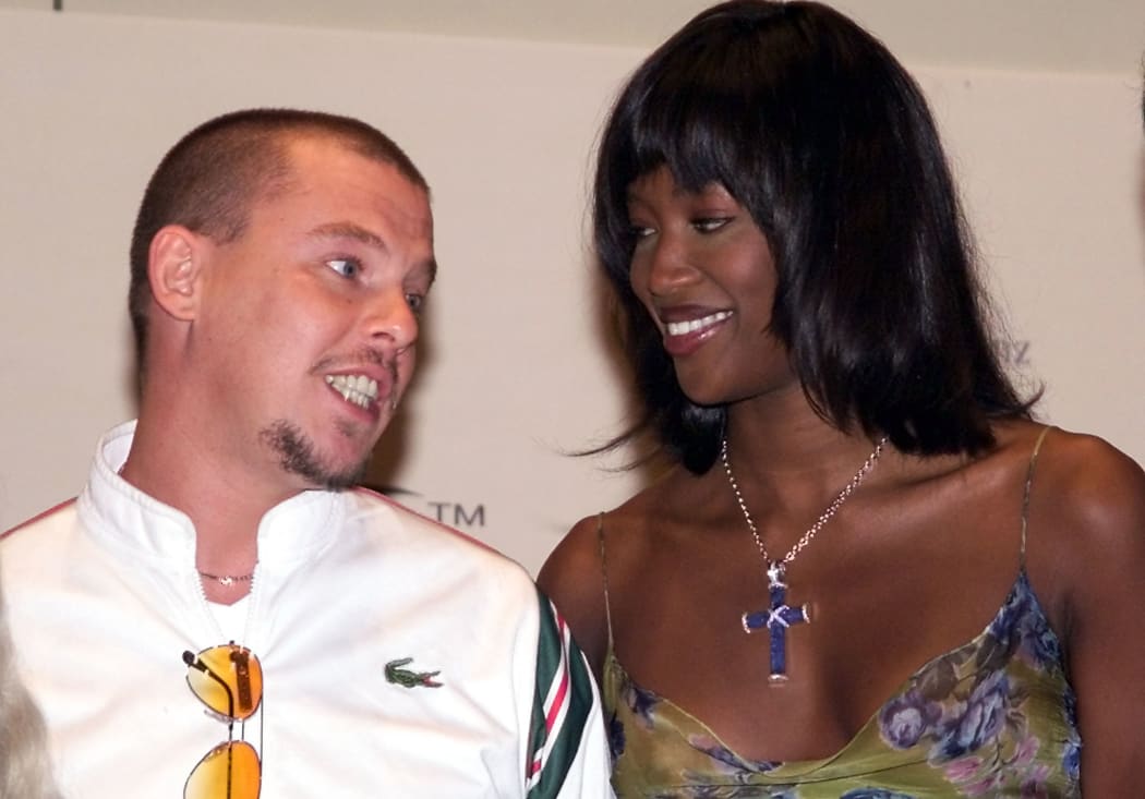 Fashion designer Alexander Mc Queen and top model Naomi Campbell pose for photographers at the Laureus Sports Awards preview.