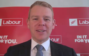 Labour leader Chris Hipkins held a media conference on Zoom from a hotel room, as he isolated due to a Covid-19 diagnosis on the campaign trail.