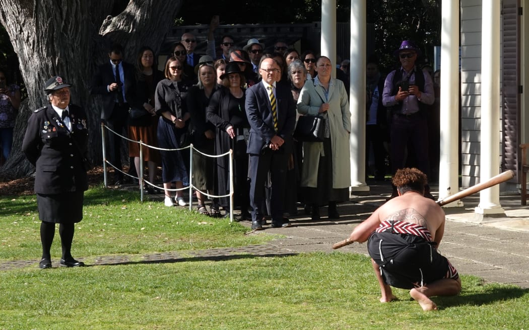 Rehia Rameka issues a challenge to presiding officer Craig Coxhead as members of the Waitangi Tribunal arrive at the Treaty Grounds.