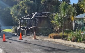A wooden building at Tauranga Historic Village which housed Rainbow Youth's offices and Gender Dynamix - a metal health organisation for gender diverse people - was damaged by fire on 16 June, 2022.