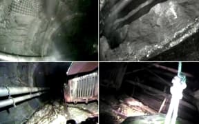 The footage shows a robot and two mine safety workers inside the Pike River Mine, about three months after the deadly 2010 disaster.