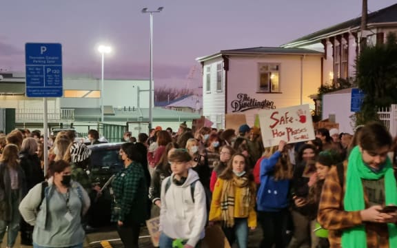Demonstraters marched to the US embassy in Wellington on Friday night, protesting against the US Supreme Court's ruling on abortion law.
