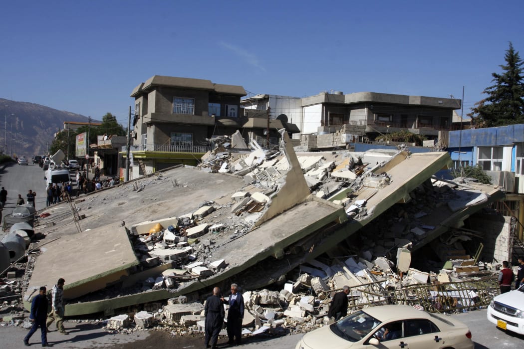 A building in the town of Darbandikhan, in Iraq's Kurdistan region, levelled by the quake.