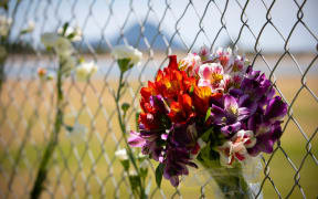 Flowers have been laid at the Port of Tauranga.