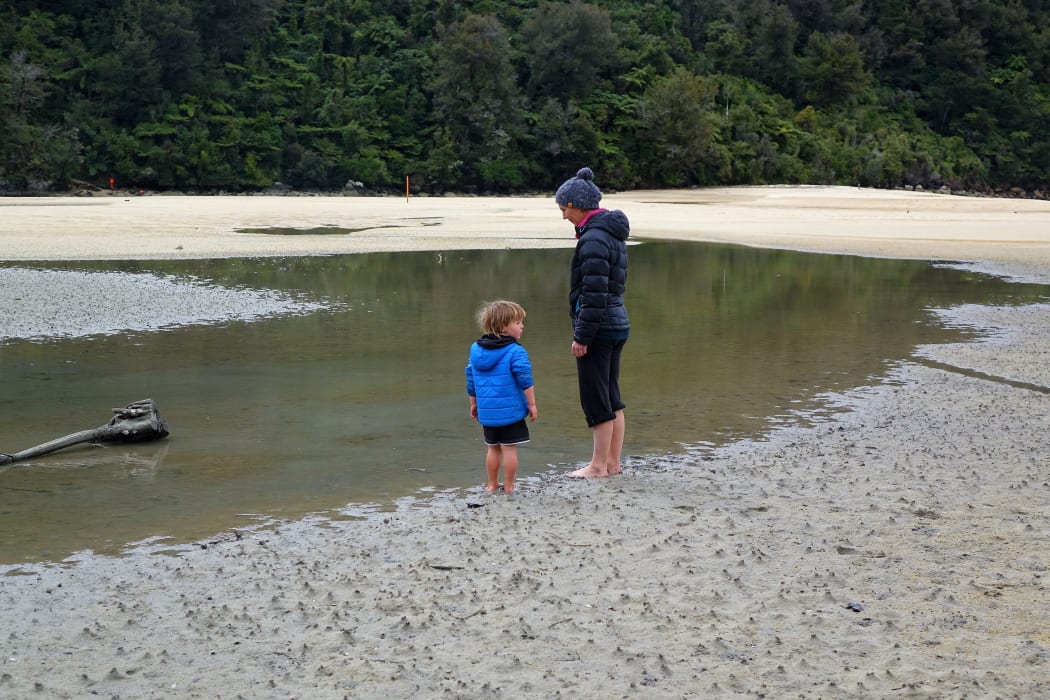 A mum and toddler in the Abel Tasman National Park where it's expected more Kiwis will get the chance to see.