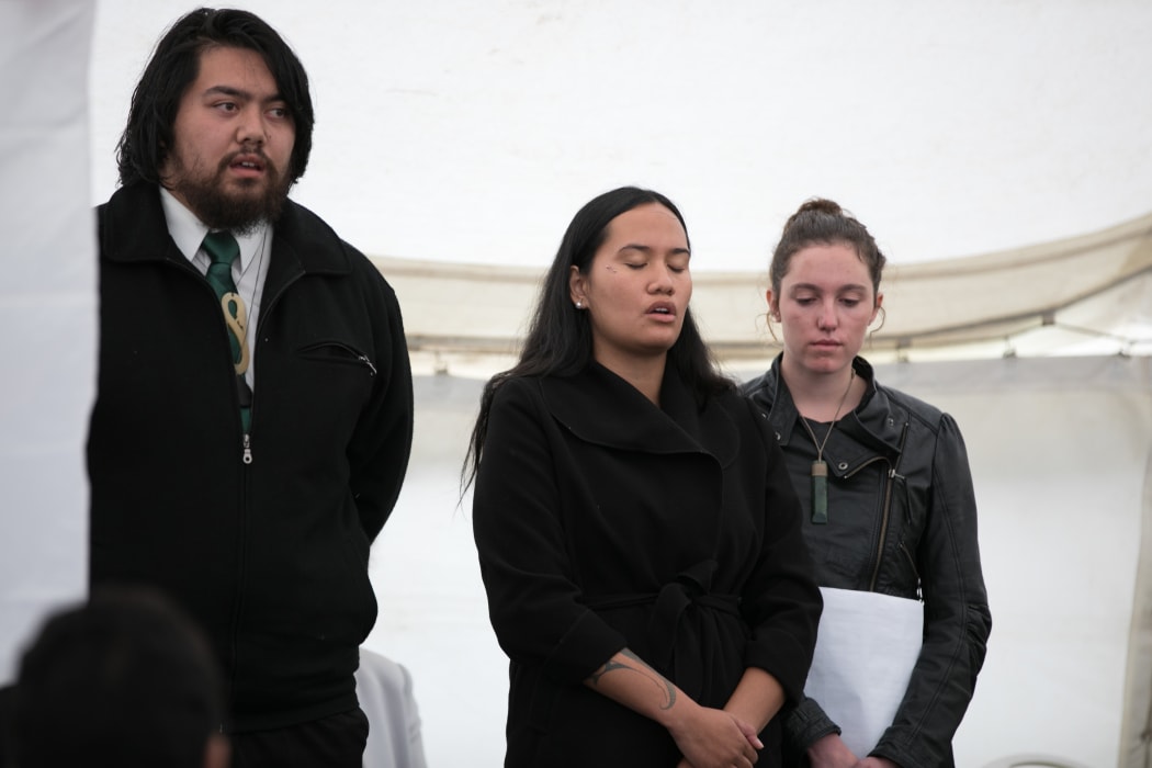 Students of Otorohanga College, (L-R) Zac Henry, Waimarama Anderson and Leah Bell give presentation at the National Commemorations in Russell