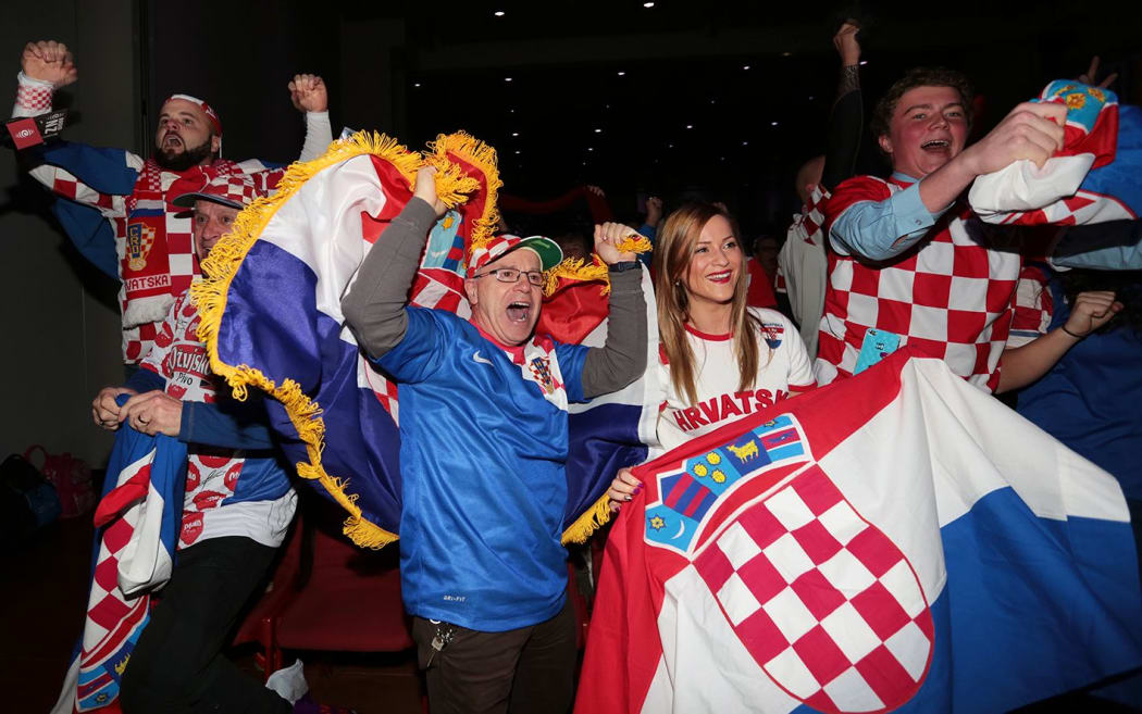 Croatian fans in Wellington celebrate the first goal of the competition.