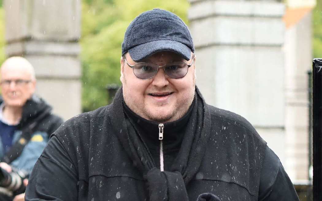 Internet mogul Kim Dotcom leaves following his extradition appeal at the High Court in Auckland on August 29, 2016.