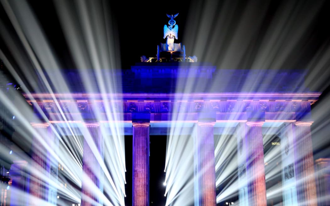 A light show at the Brandenburg Gate as part of celebrations for the 25th anniversary of the fall of the Berlin Wall.