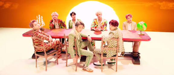 BTS in their music video 'Idol'.