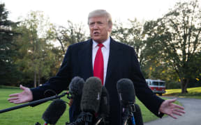 US President Donald Trump speaks to the press before departing the White House in Washington, DC, on November 4, 2019 for a campaign rally in Kentucky. (Photo by NICHOLAS KAMM / AFP)