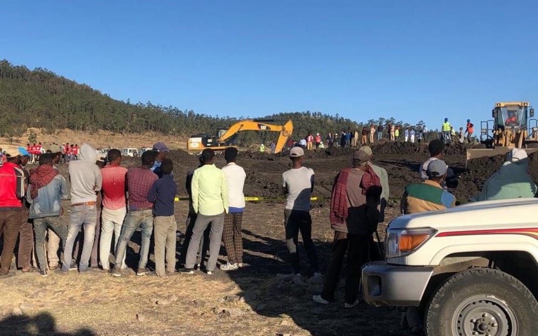 Teams continue the debris removal operation at the crash site of Ethiopia Airlines near Debre Zeit, a town some 50 kilometres south of Addis Ababa, Ethiopia, on March 10, 2019.