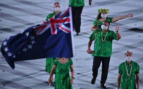 The Cook Islands' delegation parade during the opening ceremony of the Tokyo 2020 Olympic Games.