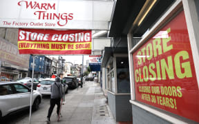 A pedestrian walks by a sore that is closing on August 11, 2020 in San Francisco, California. More than 2,000 businesses in the San Francisco Bay Area have permanently closed.