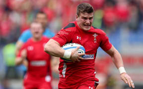 Welshman Scott Williams runs in a try in Rome, but in the end the Welsh finished runners-up to Ireland