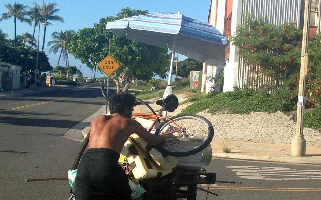 Homeless man in Honolulu. Source: Grassroot Institute of Hawaii.