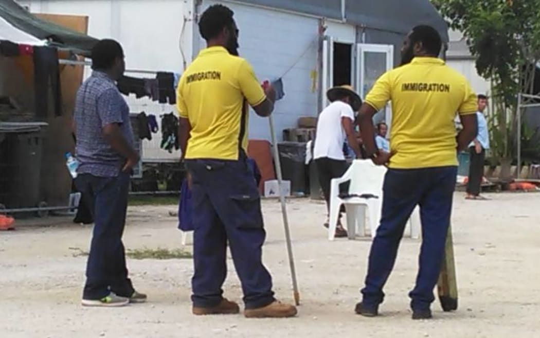 Personnel from the PNG immigration department inside the detention centre.