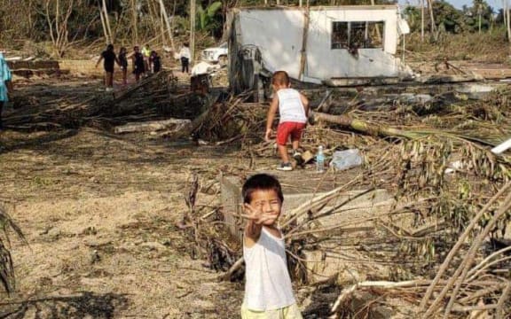 Children in Nuku'alofa in the aftermath of the eruption of Hunga Tonga-Hunga Ha'apai and tsunami.