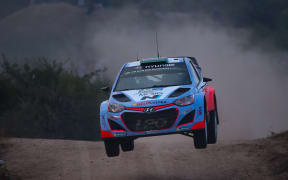 New Zealander driver Hayden Paddon steers his Hyundai i20 WRC with co-driver John Kennard during the WRC Rally Argentina on 25 April.