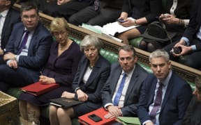 UK Prime Minister Theresa May, centre, with front bench colleagues.