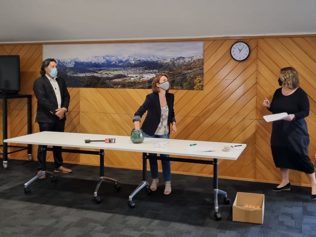 Koru Homes housing initiative chose which first-homebuyers would qualify for the fixed rate houses with a vase and some ping pong balls.