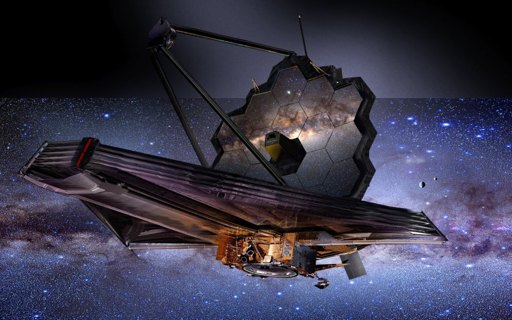 James Webb Space Telescope (JWST), illustration. This infrared telescope launched in December 2021. It is positioned near the Earth-Sun L2 Lagrange point. It has a 6.5-metre-diameter mirror with which it studies the formation of stars and planetary systems, and the history of the universe. By using infrared wavelengths, the JWST will be able to see through much of the dust that obscures visible light. It studies dark matter, which is thought to form the majority of the matter in the universe. (Photo by JAMES VAUGHAN/SCIENCE PHOTO LIBR / JVU / Science Photo Library via AFP)
