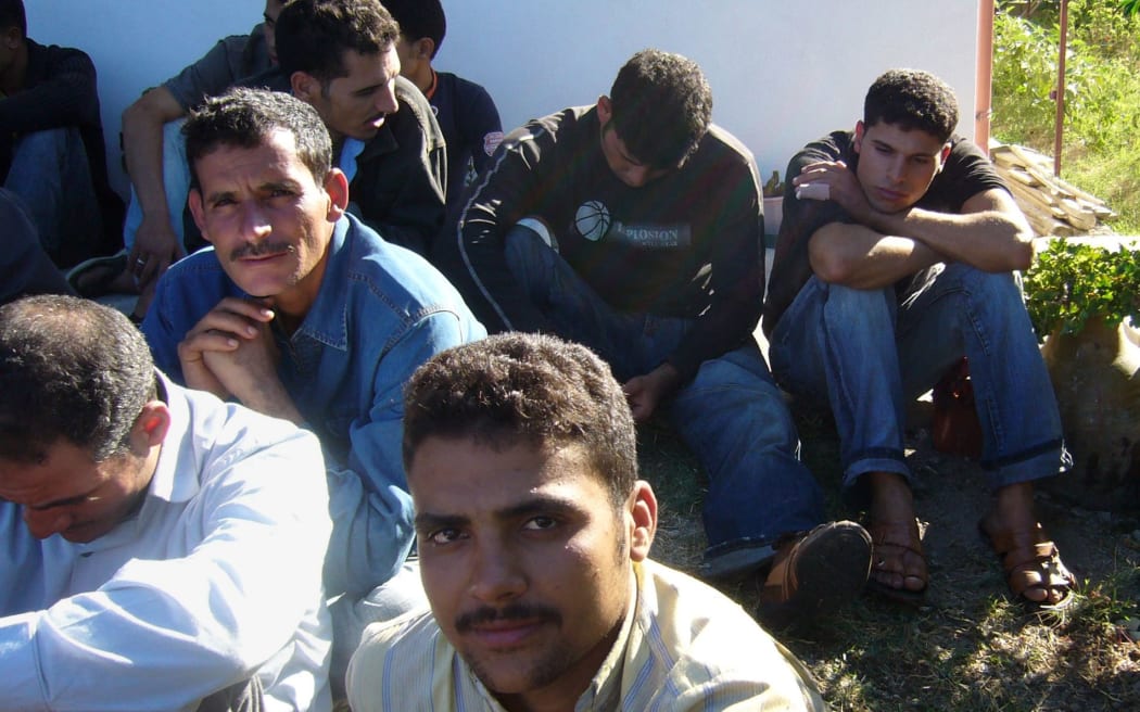 A group of illegal refugees are pictured after their arrival at Catanzaro lido, 01 October 2007.