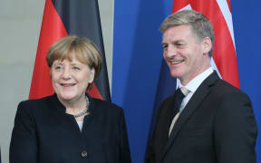German Chancellor Angela Merkel and Prime Minister Bill English at a media conference after their meeting in Berlin.