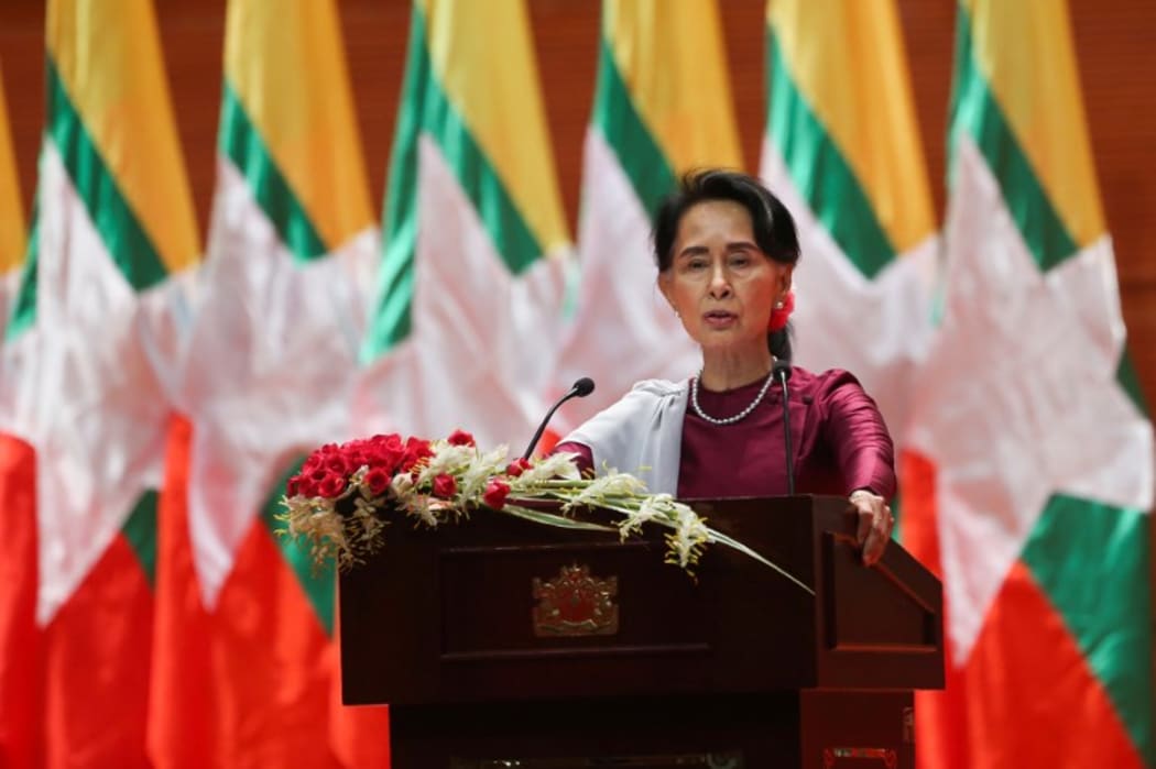 Aung San Suu Kyi delivers a national address in Naypyidaw. She said she "feels deeply" for the suffering of "all people" caught up in conflict.