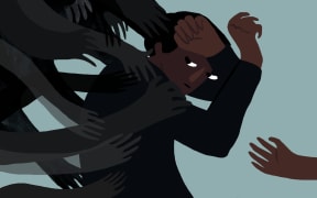 An illustration shows a young man caught in the grip of dark hands, illustrating mental health and suicide prevention.