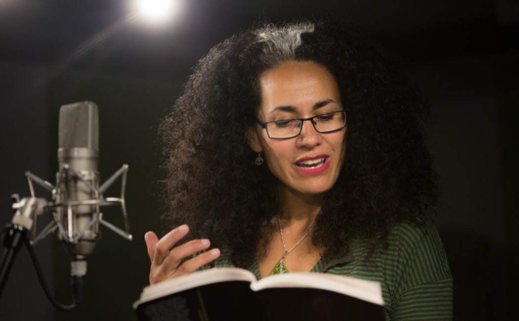 Selina Marsh reading one of her poems in the RNZ Auckland studio