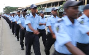 Police march during the Solomon Islands parade.