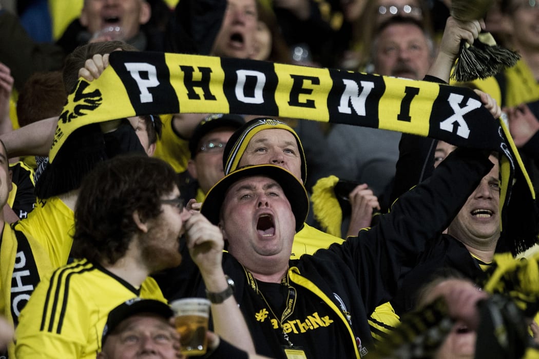 A Phoenix fan yells support during a match at Westpac Stadium in Wellington.