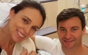 Prime Minister Jacinda Ardern and partner Clarke Gayford with their baby girl.