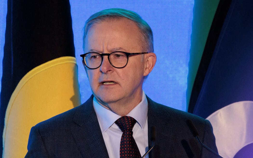 Australia Prime Minister Anthony Albanese speaks at the Sydney Energy Forum on July 12, 2022, in Sydney. - The Sydney Energy Forum brings together global leaders across government, industry, academia, technology and innovation to identify solutions to delivering clean energy supply chains across the Indo-Pacific. (Photo by Brook MITCHELL / POOL / AFP)