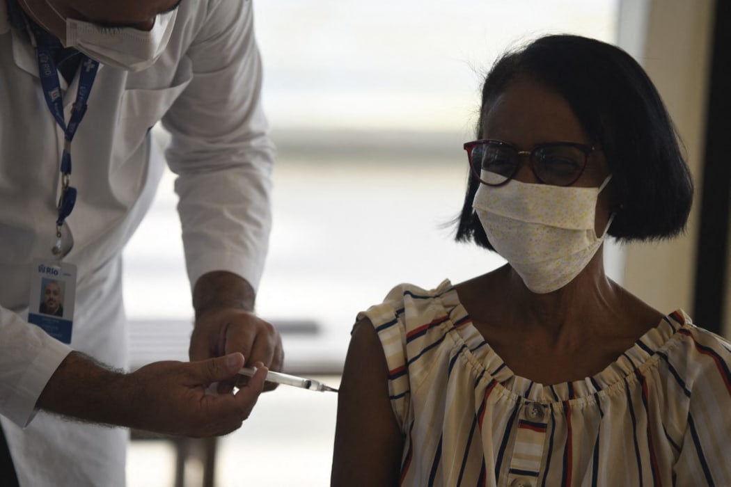 RIO DE JANEIRO, BRAZIL â APRIL 01- A medical worker injects a dose of coronavirus (COVID-19) vaccine at the Museum of Tomorrow, a tourist spot in the city's port area on April 01, 2021.