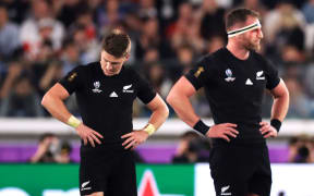 Members of England (white) and New Zealand (black) praise each other for putting up a good fight after the 2019 Rugby World Cup Japan semifinal match at International Stadium Yokohama in Yokohama City, Kanagawa Prefecture on October 26, 2019.