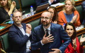 Belgian Prime Minister Charles Michel gestures after delivering a "Solemn and Memorial Declaration of the Federal Government".