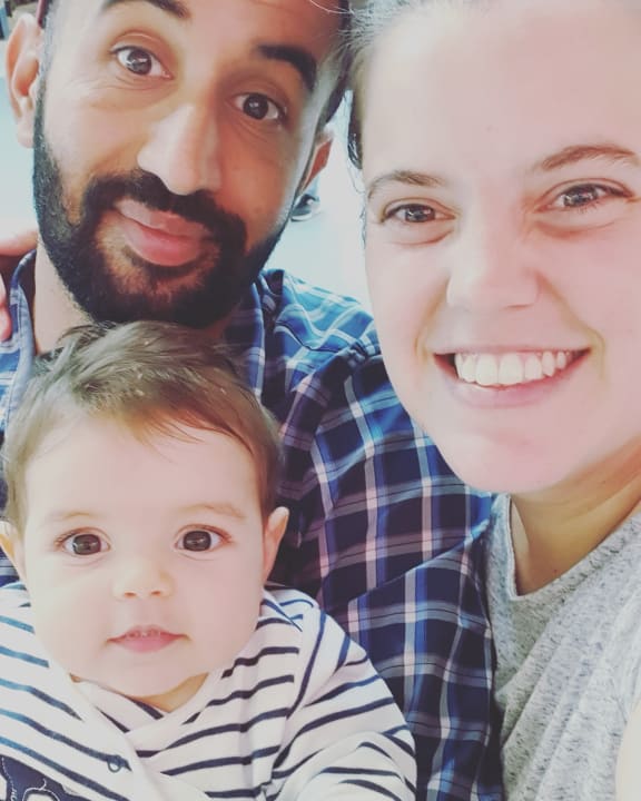 Belen Macchiavello and Hardeep Singh with their baby daughter Amy.