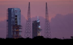 The rocket carrying NASA's Orion is seen on its launch pad before the morning's mission was scrubbed on 4 December.
