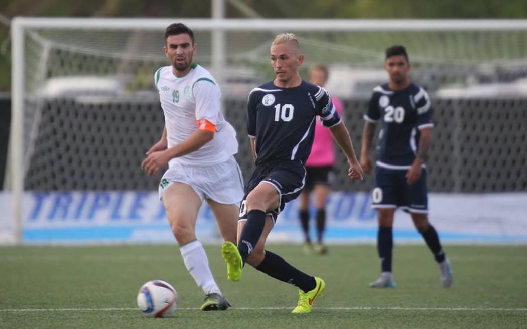 Guam captain Jason Cunliffe passes to a teammate during the Matao's first-ever World Cup Qualifier against Turkmenistan.