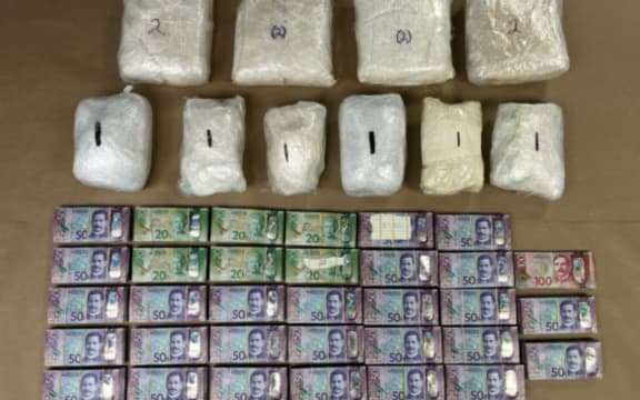 Drugs and cash seized by police in February 2023.