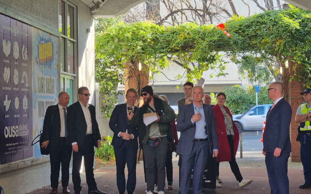 Someone taking a selfie with Prime Minister Chris Hipkins during his visit the University of Otago on 2 June 2023.
