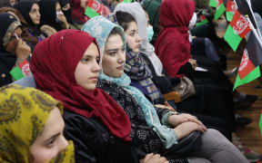 KABUL, AFGHANISTAN - MARCH 29: Afghan women, youths, activists and elders gather at a rally to support peace talks and the republic government in Kabul, Afghanistan, on March 29, 2021.